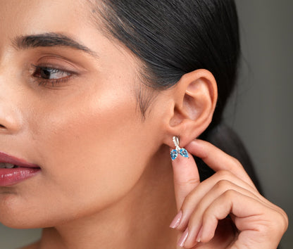 Eternal Peace Swiss Blue Topaz Studs