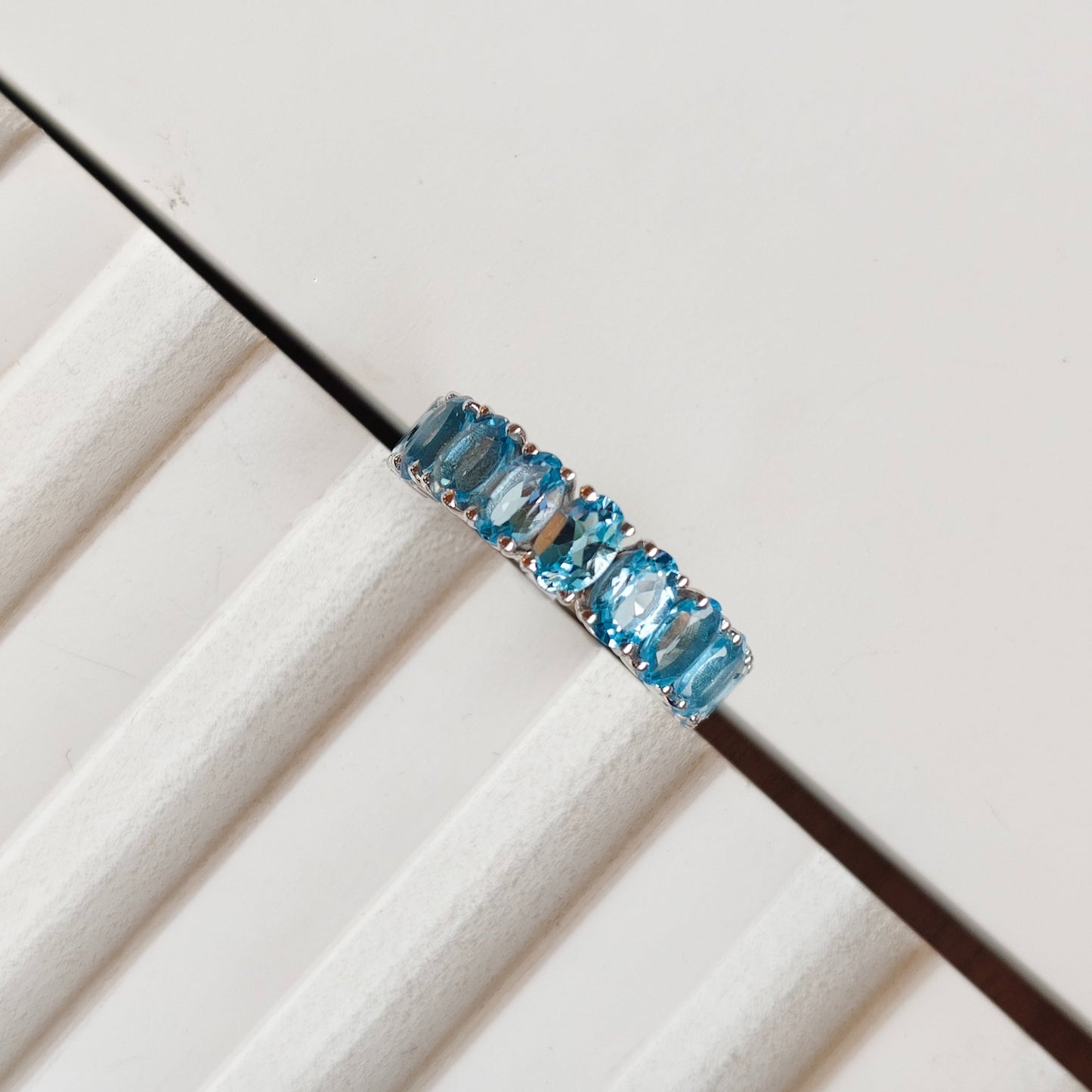 Graceful Curve Swiss Blue Topaz Ring