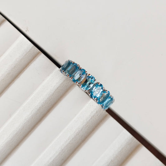 Graceful Curve Swiss Blue Topaz Ring