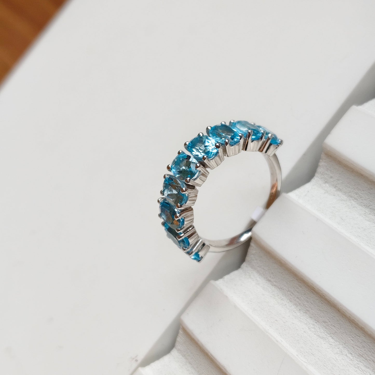 Graceful Curve Swiss Blue Topaz Ring