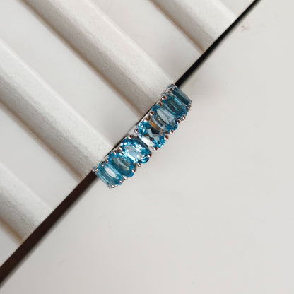 Graceful Curve Swiss Blue Topaz Ring