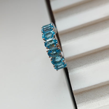 Graceful Curve Swiss Blue Topaz Ring