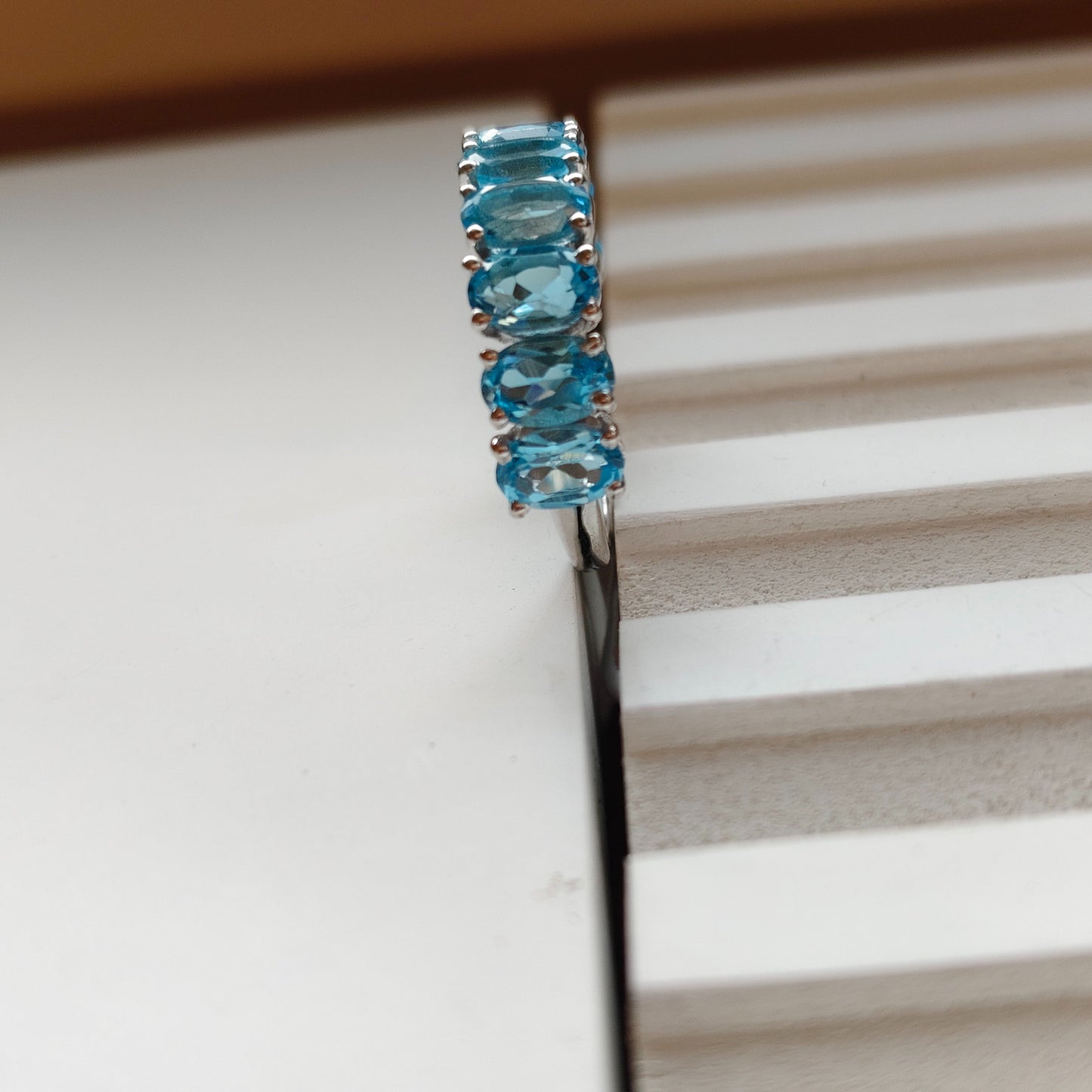 Graceful Curve Swiss Blue Topaz Ring