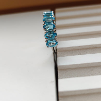 Graceful Curve Swiss Blue Topaz Ring