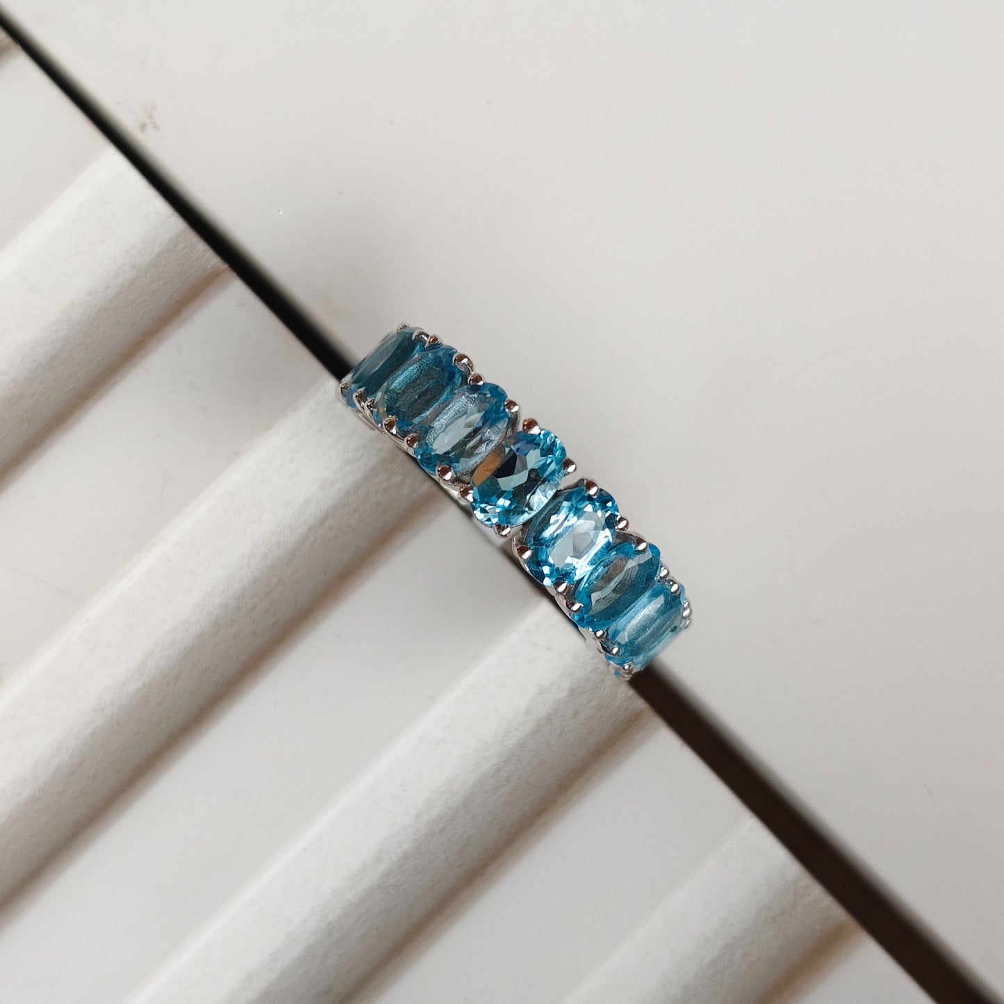 Graceful Curve Swiss Blue Topaz Ring