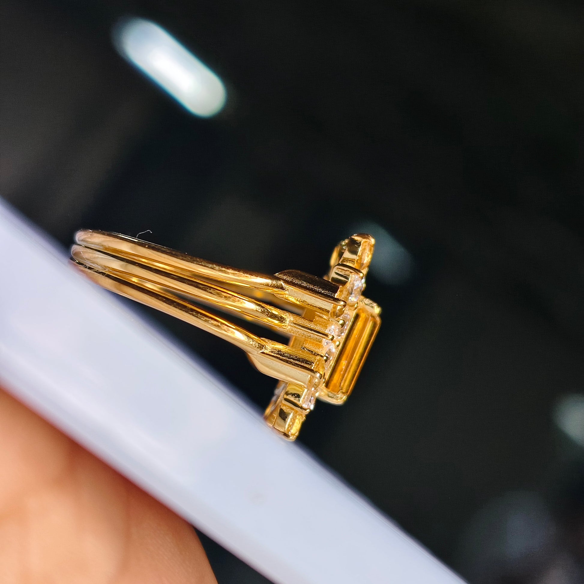Gold hair clip on a blurred background