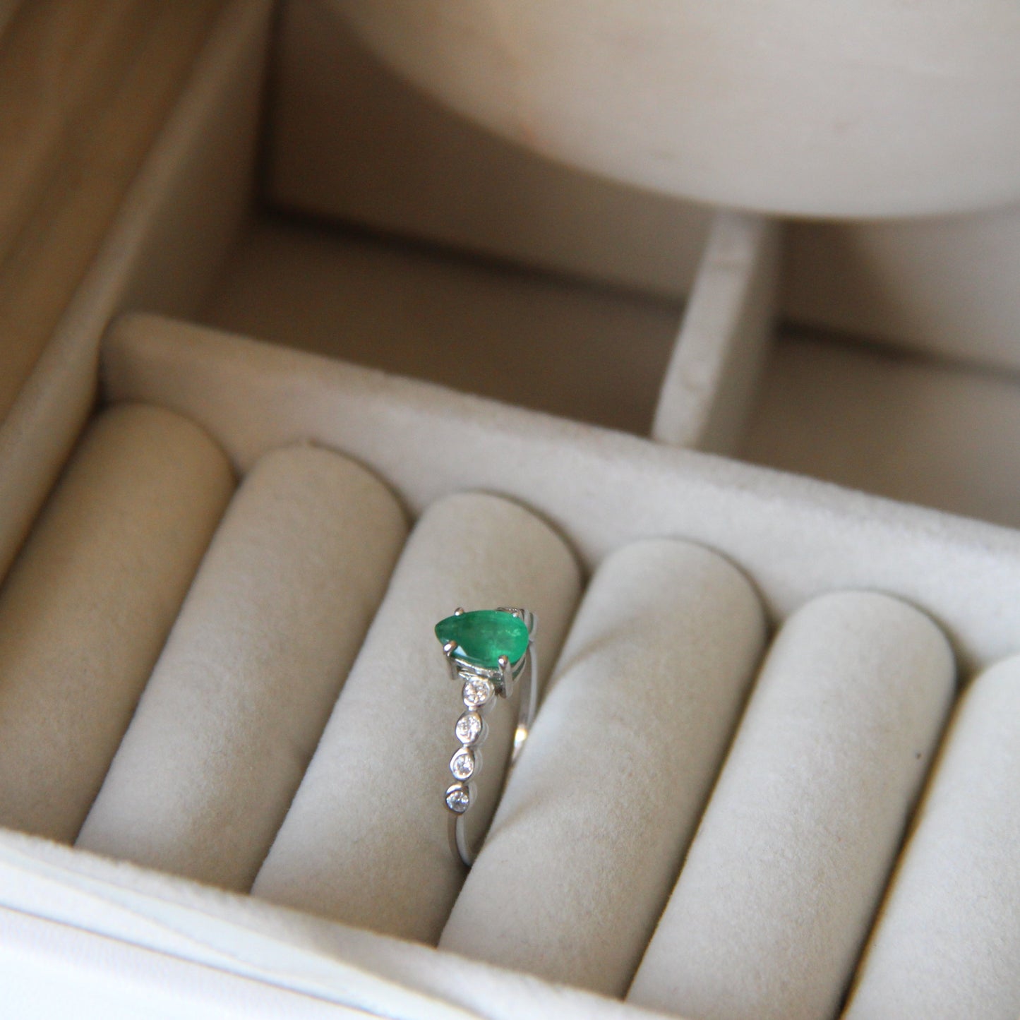 Dewdrop Muse Emerald Ring