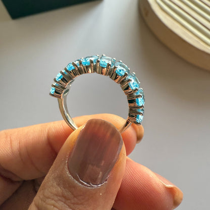 Graceful Curve Swiss Blue Topaz Ring