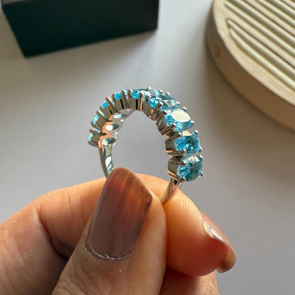 Graceful Curve Swiss Blue Topaz Ring