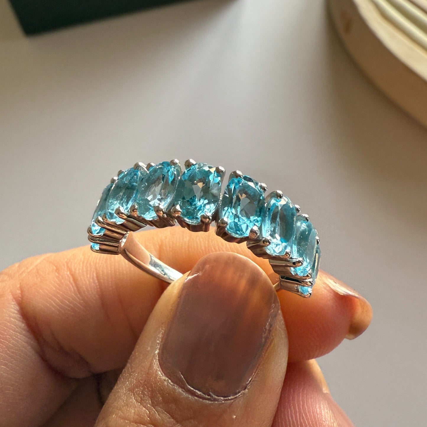 Graceful Curve Swiss Blue Topaz Ring