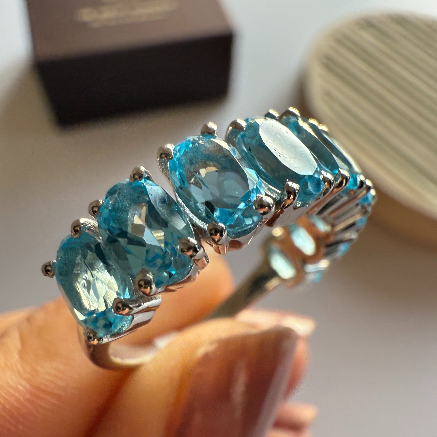 Graceful Curve Swiss Blue Topaz Ring
