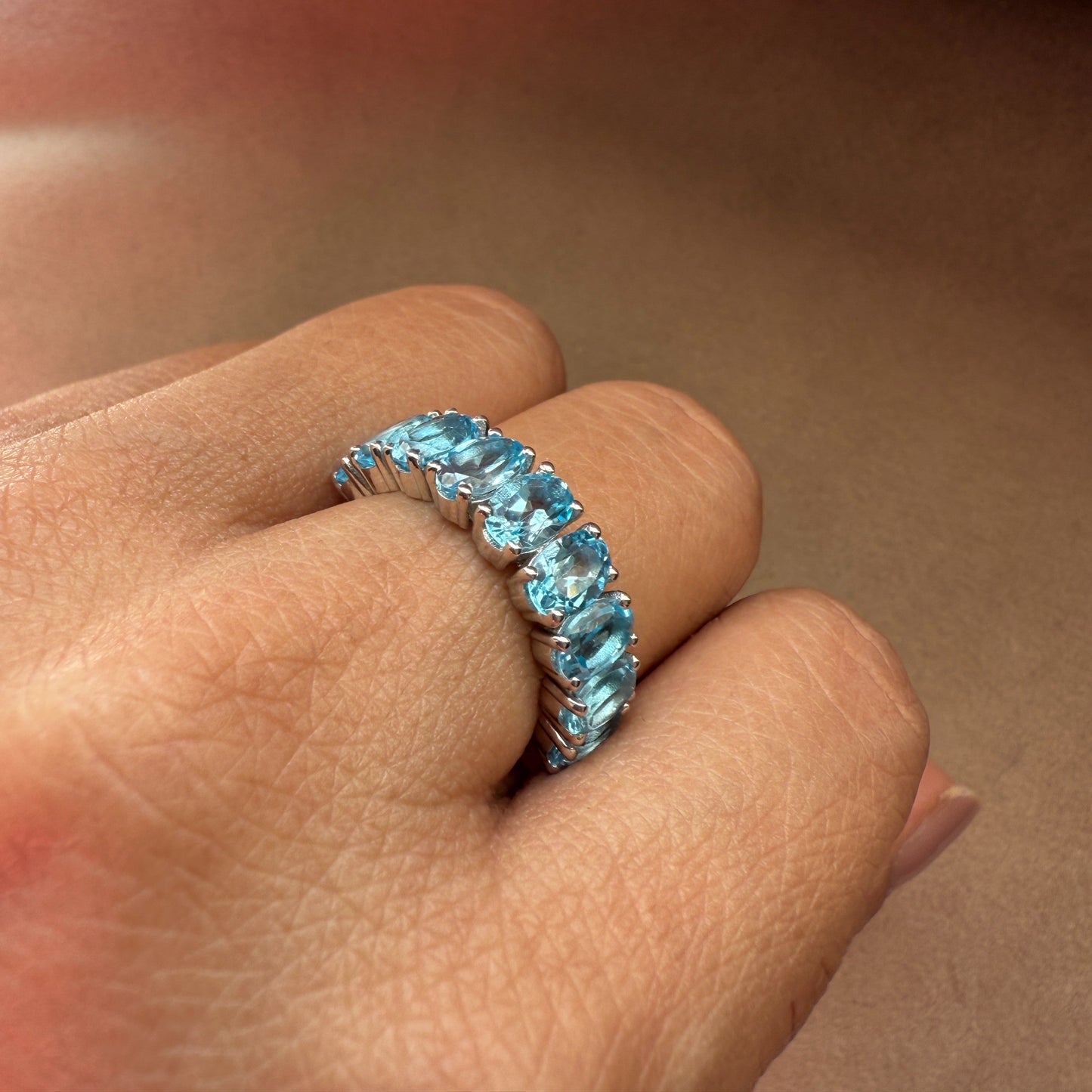 Graceful Curve Swiss Blue Topaz Ring