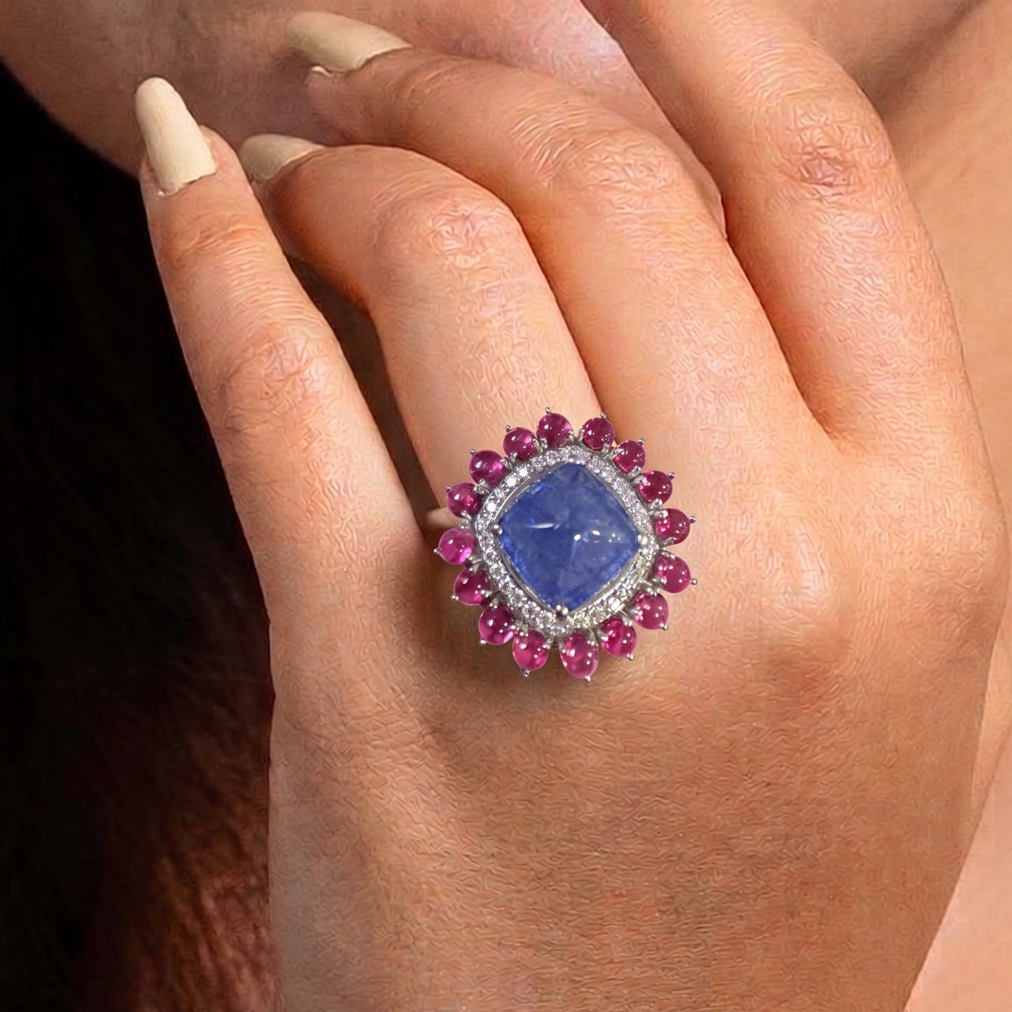 Ring in 925 silver in natural Tanzanite and pink tourmalines combination hand