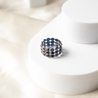 Triple Elegance Blue Sapphire Gold Ring