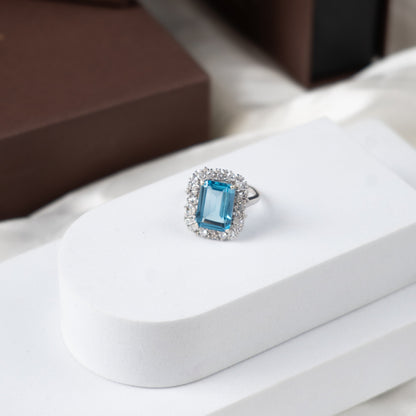 Halo Majesty Swiss Blue Topaz Ring
